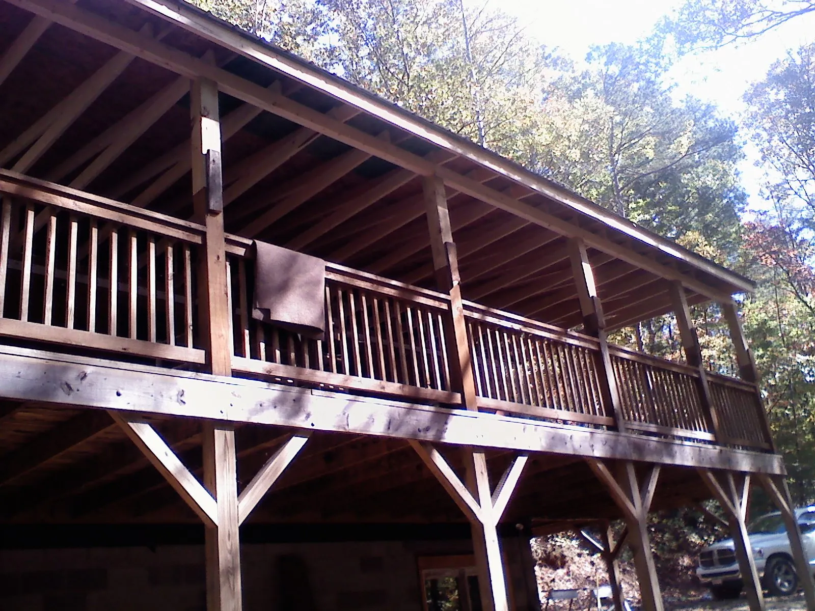 Timber framing under a new elevated porch and deck — Roof Leak Repair in Leitchfield by Roofing Brothers